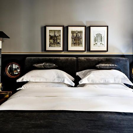 Monsieur George Hotel & Spa - Champs-Elysees Párizs Kültér fotó A room at the Hotel Axelmannstein
