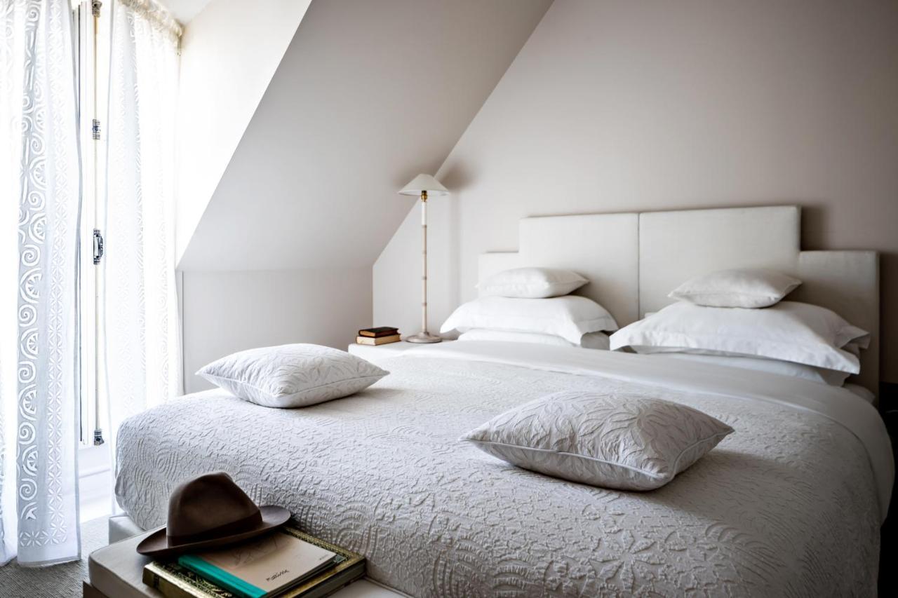 Monsieur George Hotel & Spa - Champs-Elysees Párizs Kültér fotó A bedroom